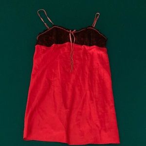 Red silk slip dress with lace and velvet details